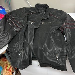 Leather jacket. Motorcycle jacket style but not a motorcycle jacket. Size large